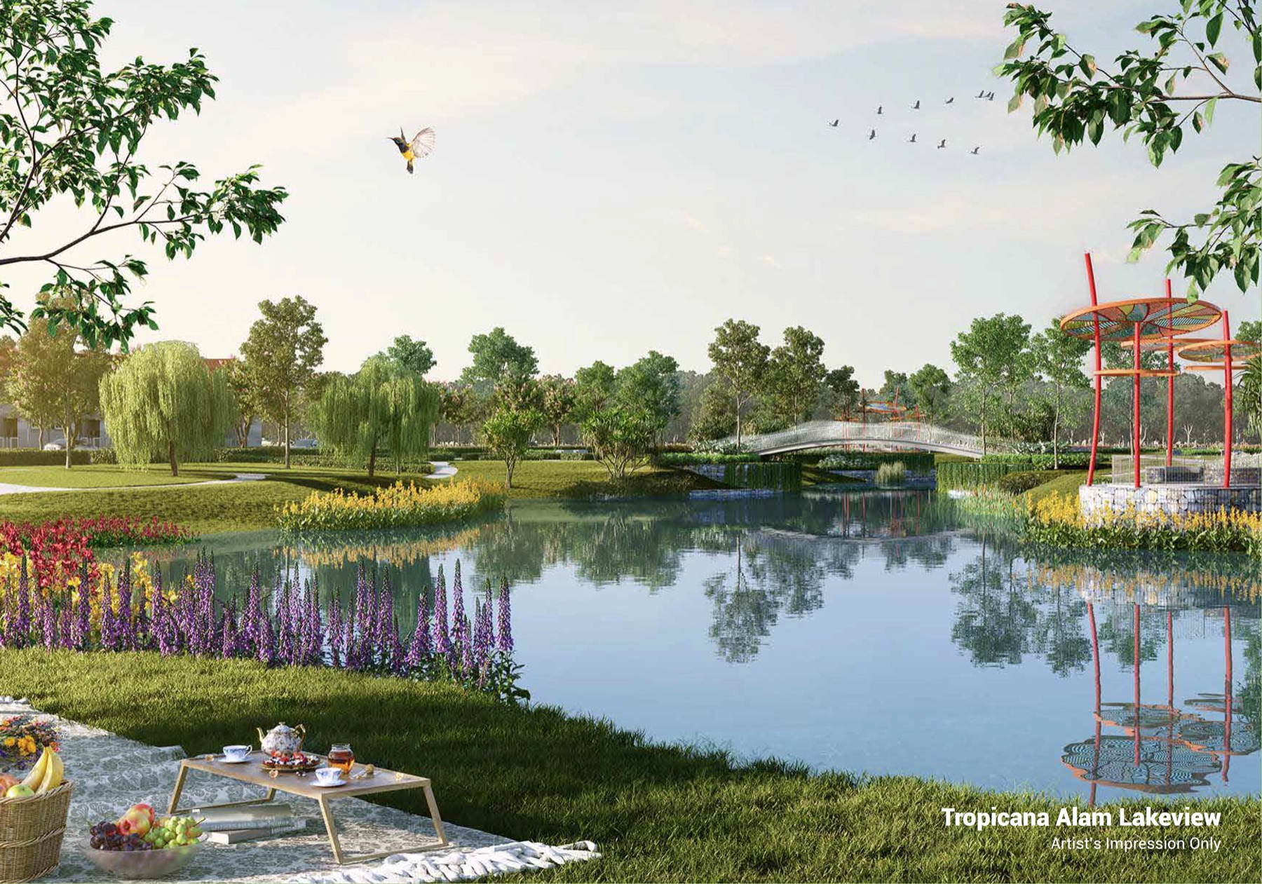 Tropicana Alam lakeview park with flowering gardens and pedestrian bridge