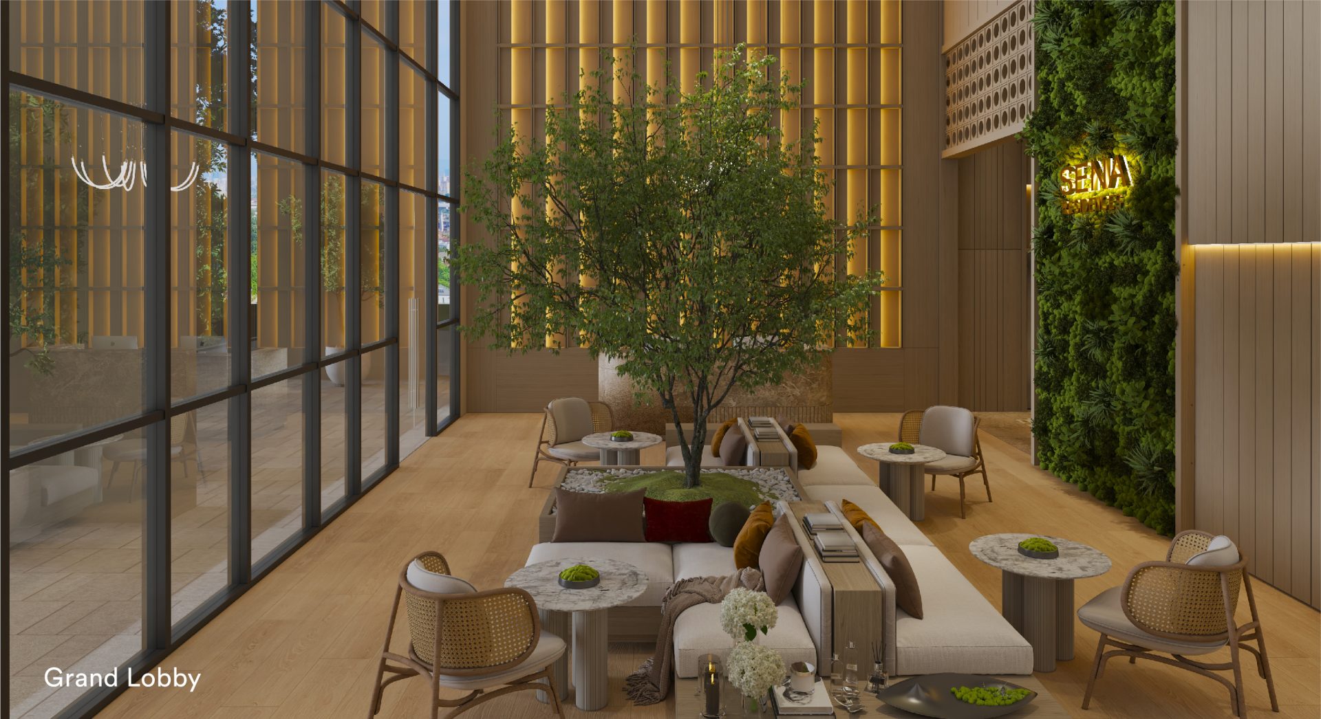 Grand lobby of Sena Residences with double-volume ceilings, feature tree and green wall