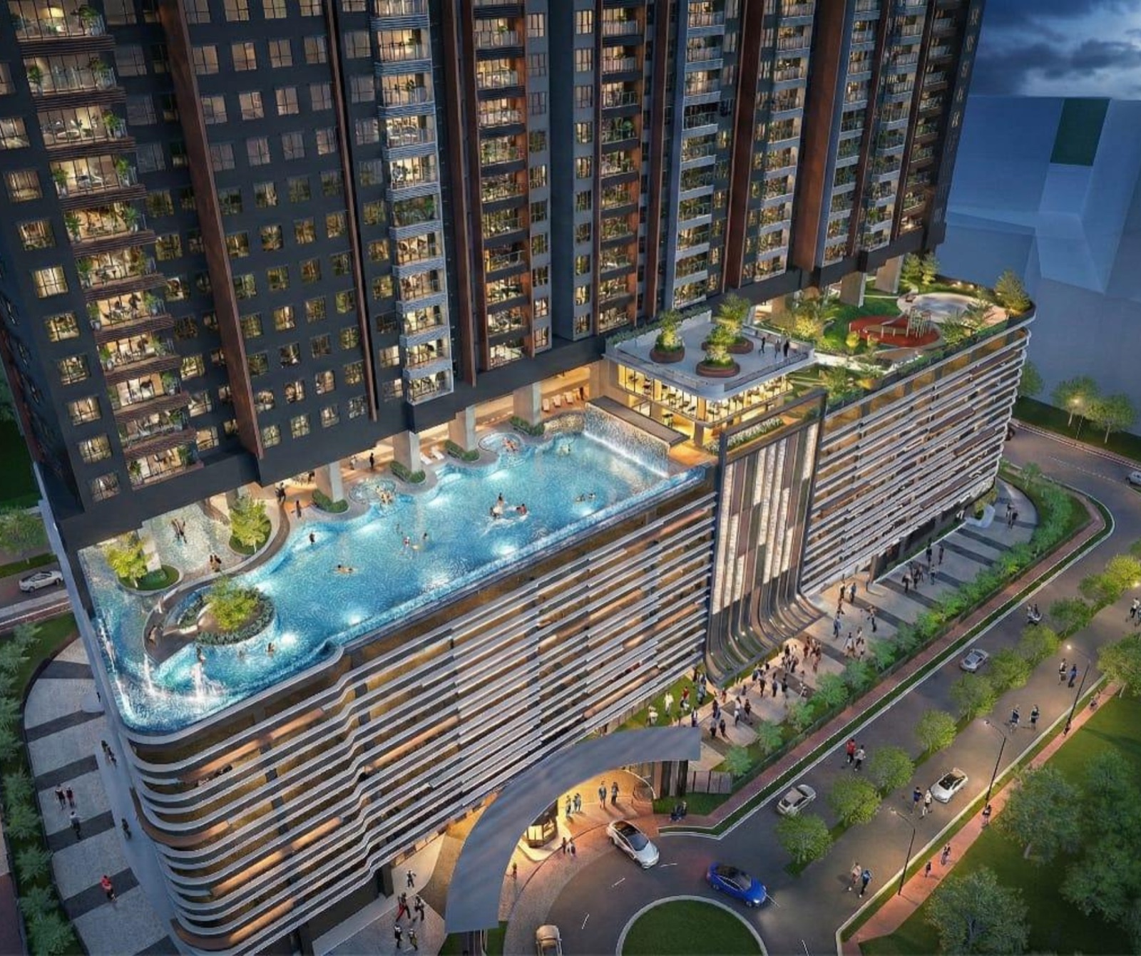 Facilities deck with 50m lap pool at night